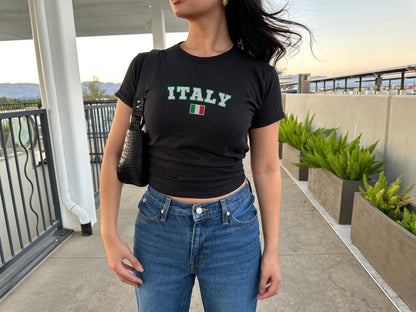 Blue baby tee with varsity ITALY lettering and Italian flag graphic