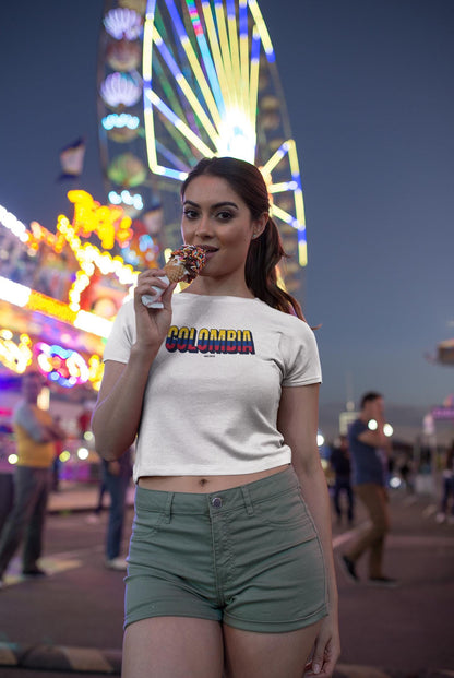 Yellow baby tee with a Colombia wordmark in flag colors on the chest