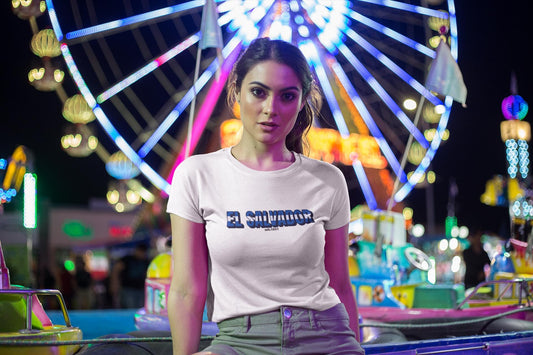 White baby tee with blue EL SALVADOR text and small est. 1821 detail