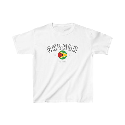 White baby tee with arched Guyana text, circular flag graphic, stars, and est. 1970 detail