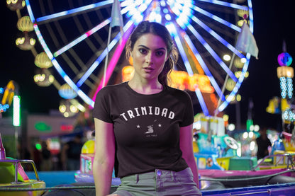 Trinidad baby tee design with arched white lettering, island graphic, stars, and 1962 detail