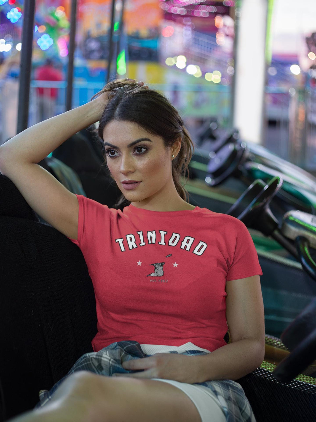 Trinidad baby tee design with arched white lettering, island graphic, stars, and 1962 detail