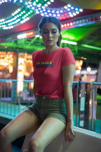 Yellow baby tee with a Colombia wordmark in flag colors on the chest