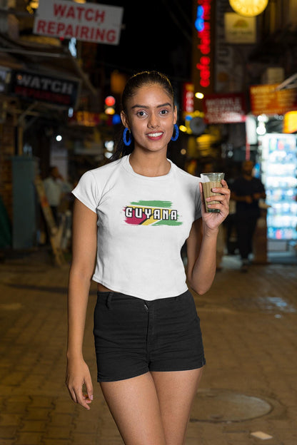 Guyana baby tee with flag brushstroke graphic and bold Guyana lettering