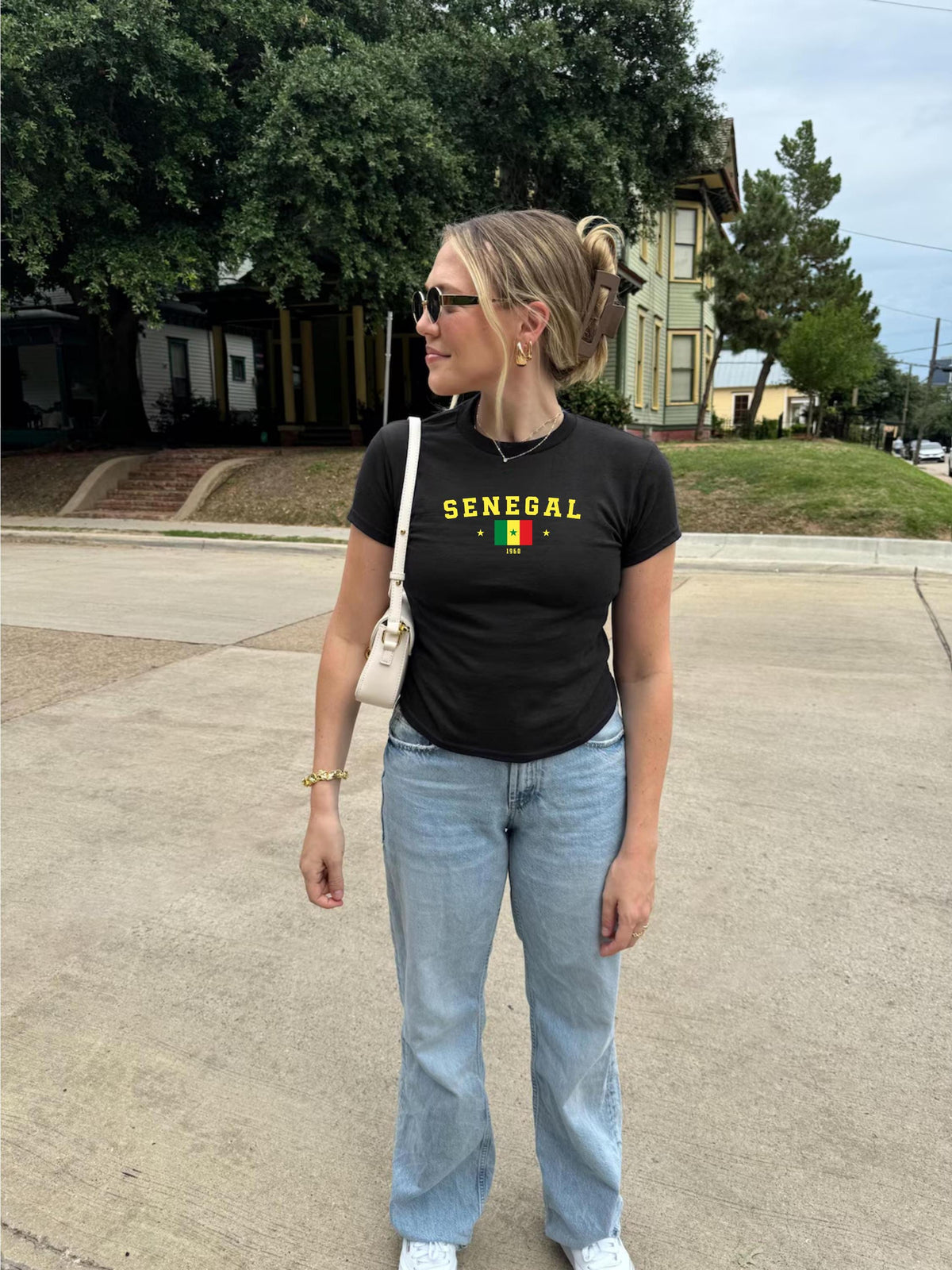 Green baby tee with SENEGAL lettering, Senegal flag, star accents, and 1960 on the front
