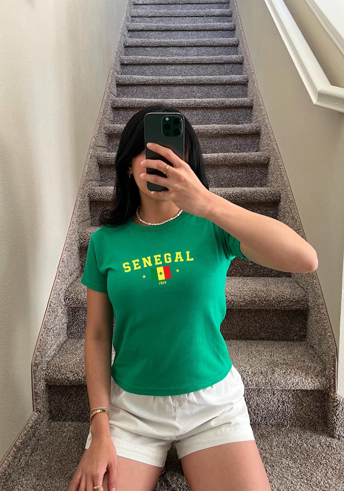 Green baby tee with SENEGAL lettering, Senegal flag, star accents, and 1960 on the front