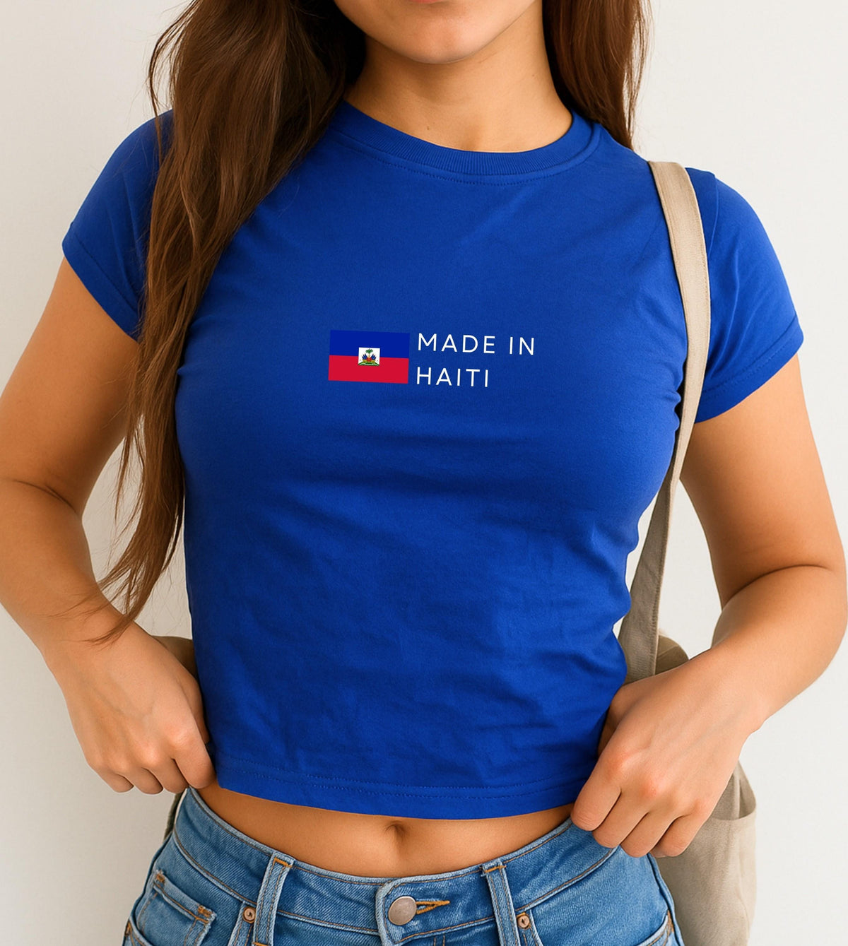 Navy baby tee with Haitian flag and white Made in Haiti text