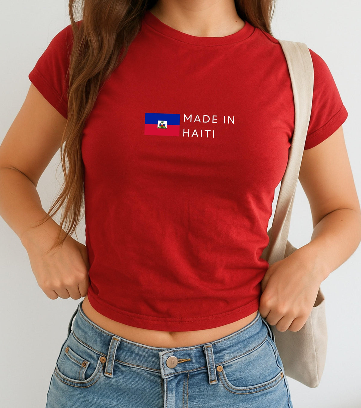 Navy baby tee with Haitian flag and white Made in Haiti text