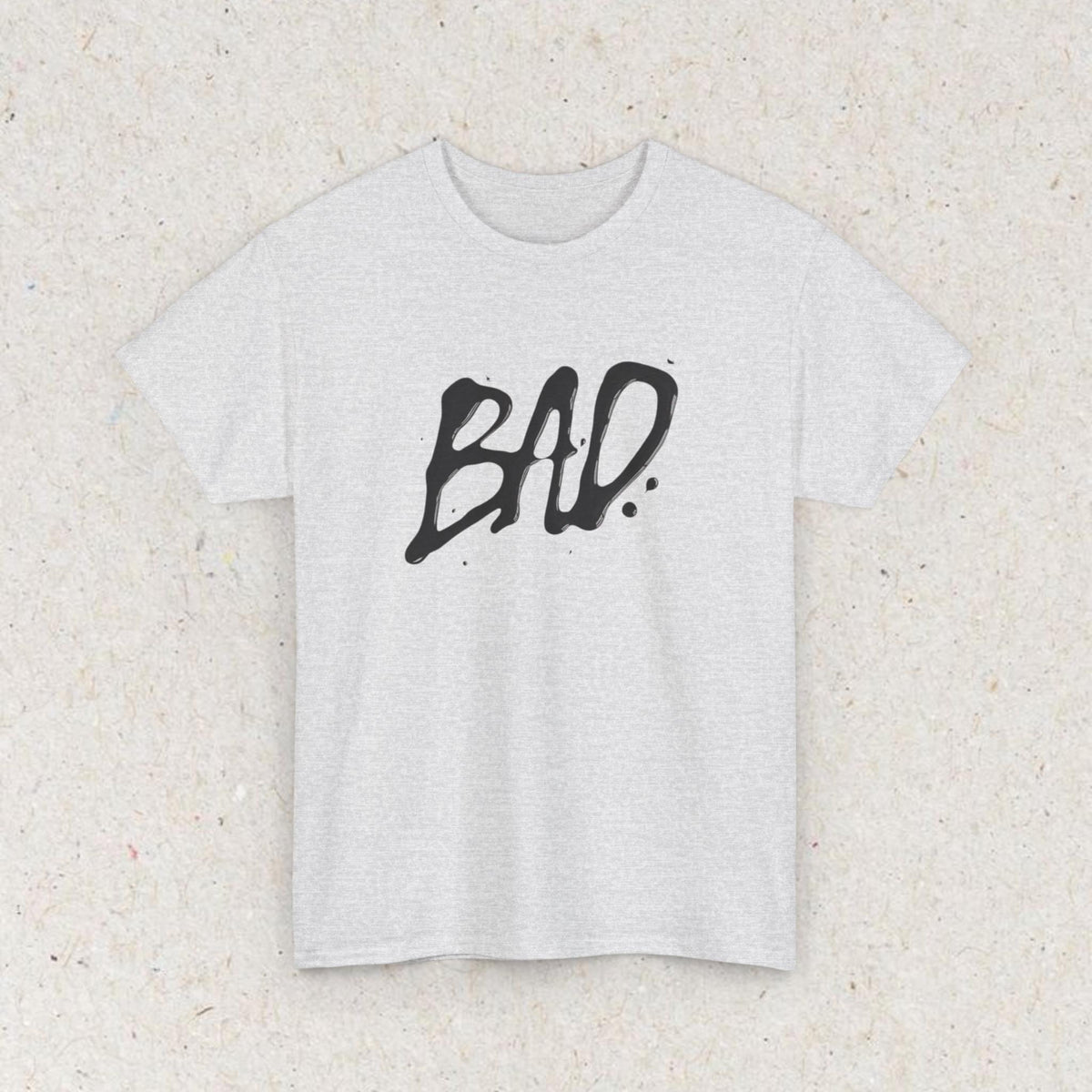 White T-shirt with bold black BAD text in a graffiti-style design