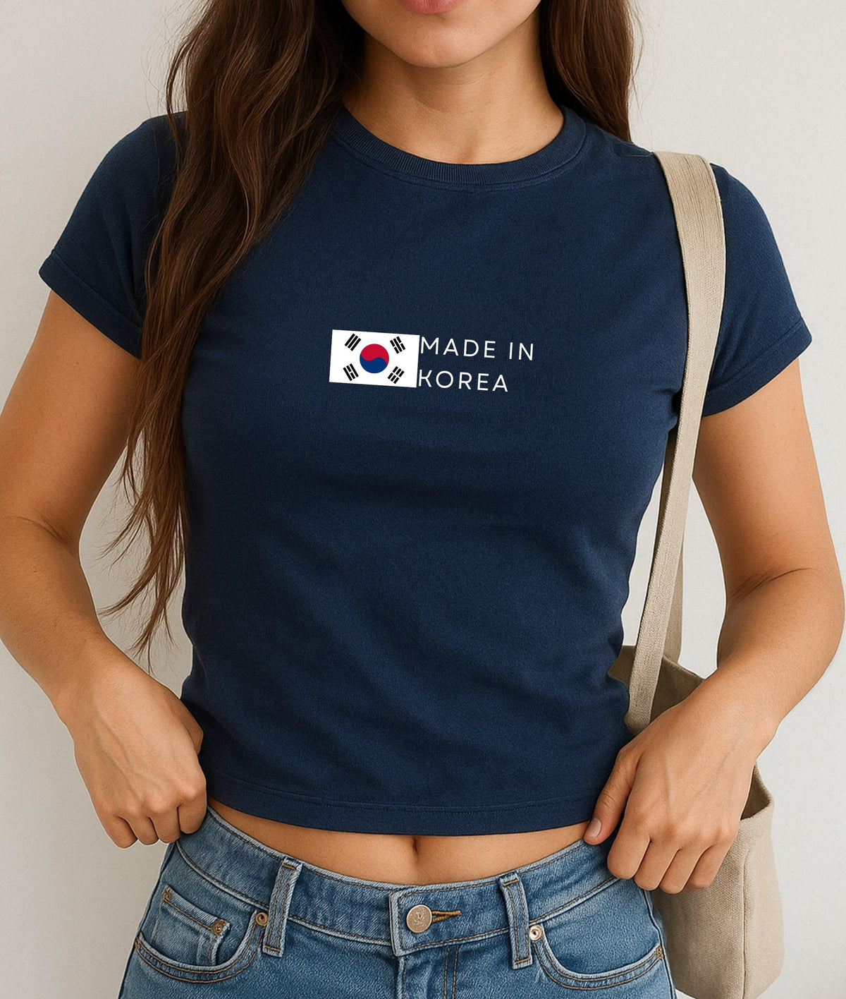 Navy baby tee with South Korea flag graphic and Made In Korea text