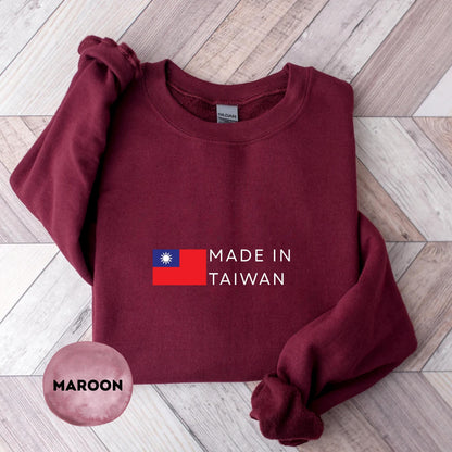 Navy crewneck sweatshirt with Taiwan flag and Made In Taiwan text design