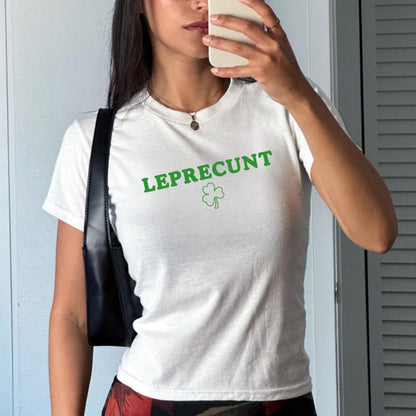 White baby tee with green LEPRECUNT lettering and a shamrock graphic