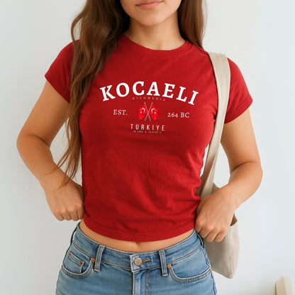 Kocaeli Türkiye baby tee with Nicomedia text, crossed Turkish flags, Est. 264 BC, and coordinates