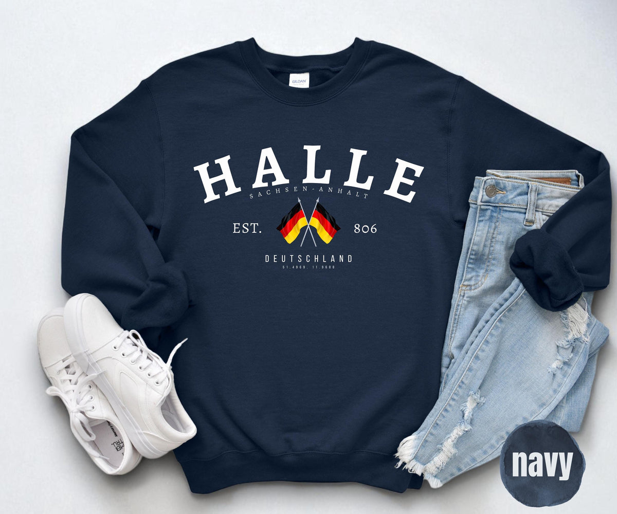 Black sweatshirt with arched HALLE text, Sachsen Anhalt, crossed German flags, EST. 806 and Deutschland coordinates