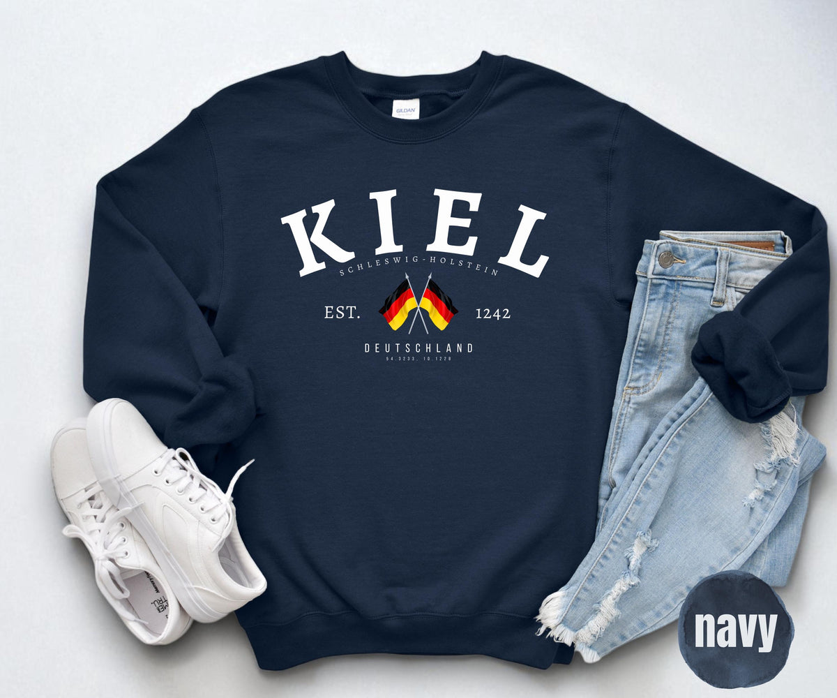 Navy sweatshirt with Kiel Schleswig-Holstein Deutschland text, crossed German flags, est. 1242 and coordinates