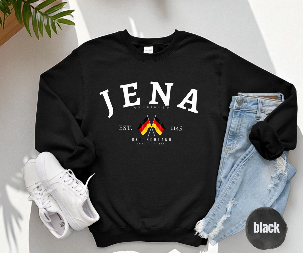 Forest green sweatshirt with Jena Thüringen text, German flags, Deutschland, coordinates, and est. 1145