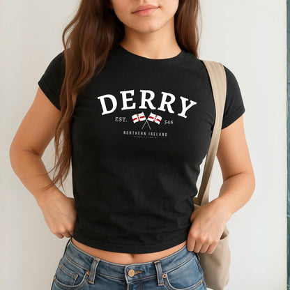 Derry Northern Ireland baby tee design with arched lettering, crossed flags, EST. 546, and coordinates