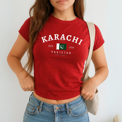 Karachi Sindh baby tee design with Pakistan flag, Est. 1729 text, and city coordinates