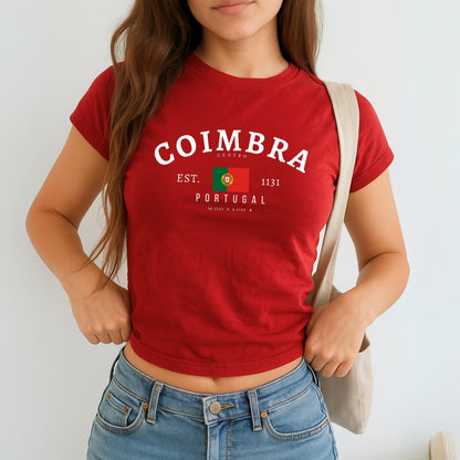 Navy baby tee with arched Coimbra Centro text, Portugal flag, Est. 1131 and coordinates