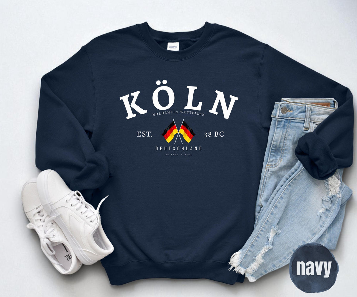 Maroon sweatshirt with white Köln text, Nordrhein-Westfalen details, and crossed German flags