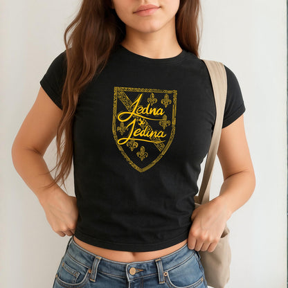 Blue baby tee with yellow Jedina si Jedina shield design and fleur-de-lis details