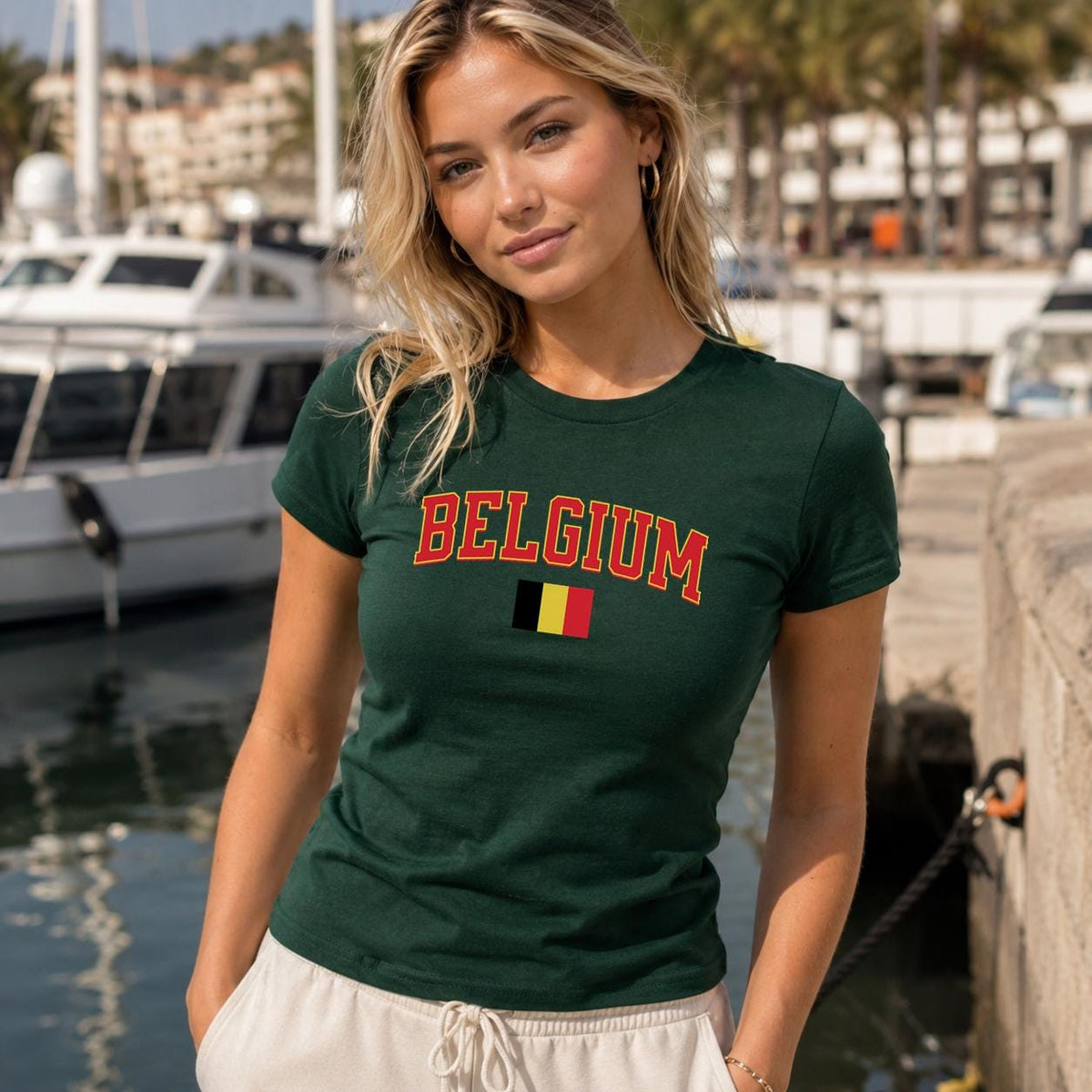Black baby tee with arched red Belgium lettering and Belgian flag graphic