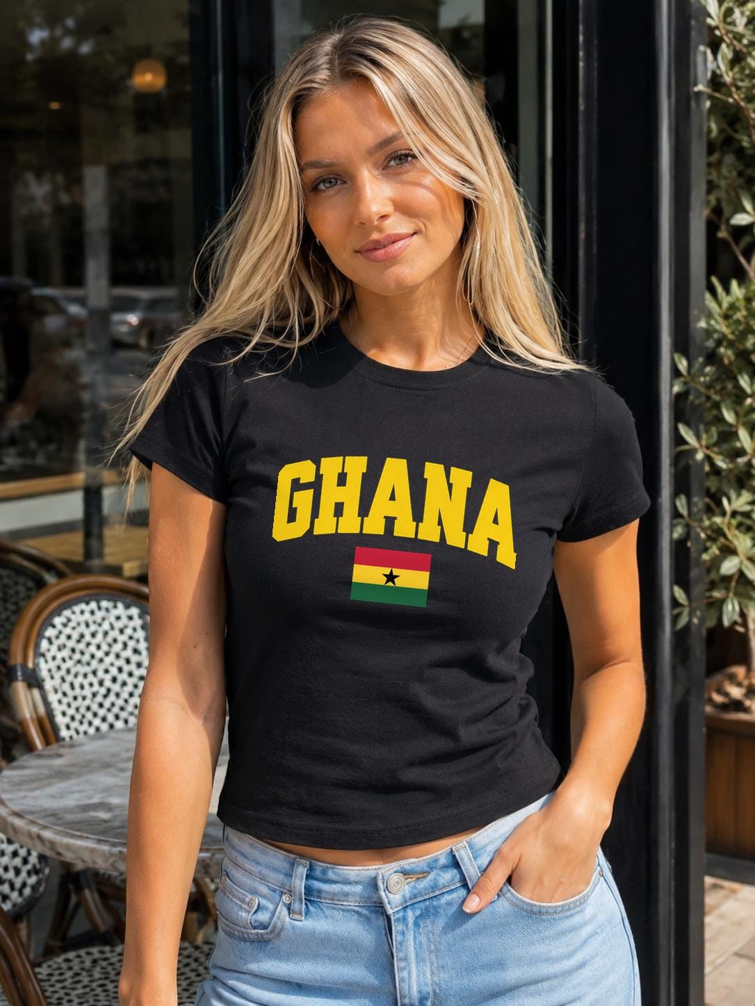 Red baby tee with yellow GHANA lettering and Ghana flag with black star