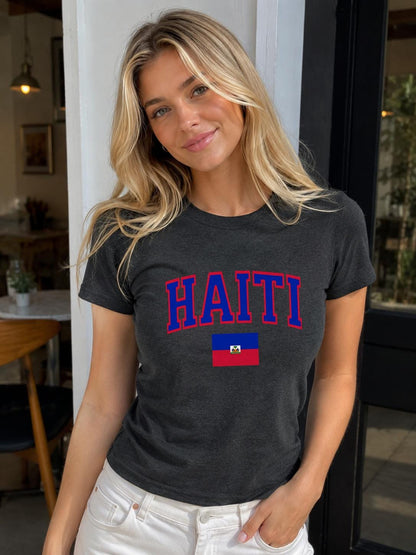 Navy baby tee with bold HAITI varsity lettering and Haitian flag graphic