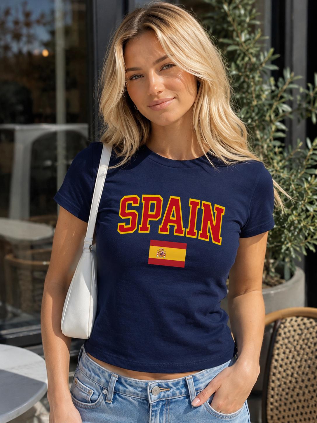 Spain baby tee with bold varsity lettering and Spanish flag graphic