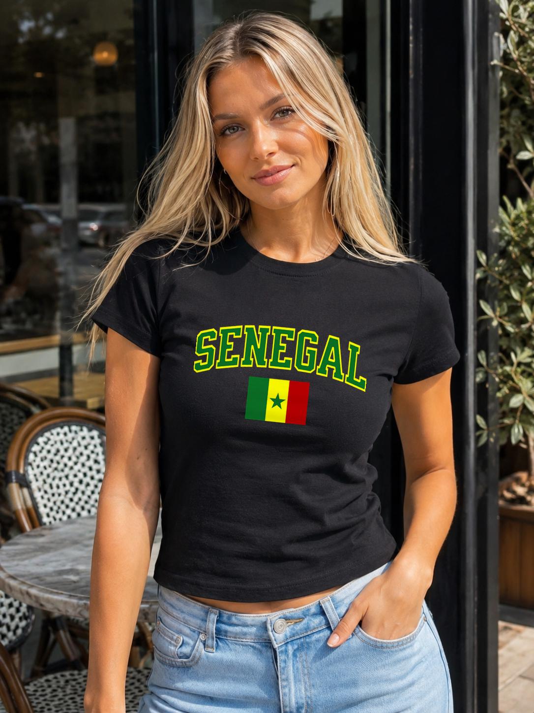 Fitted green baby tee with arched Senegal lettering and Senegal flag graphic