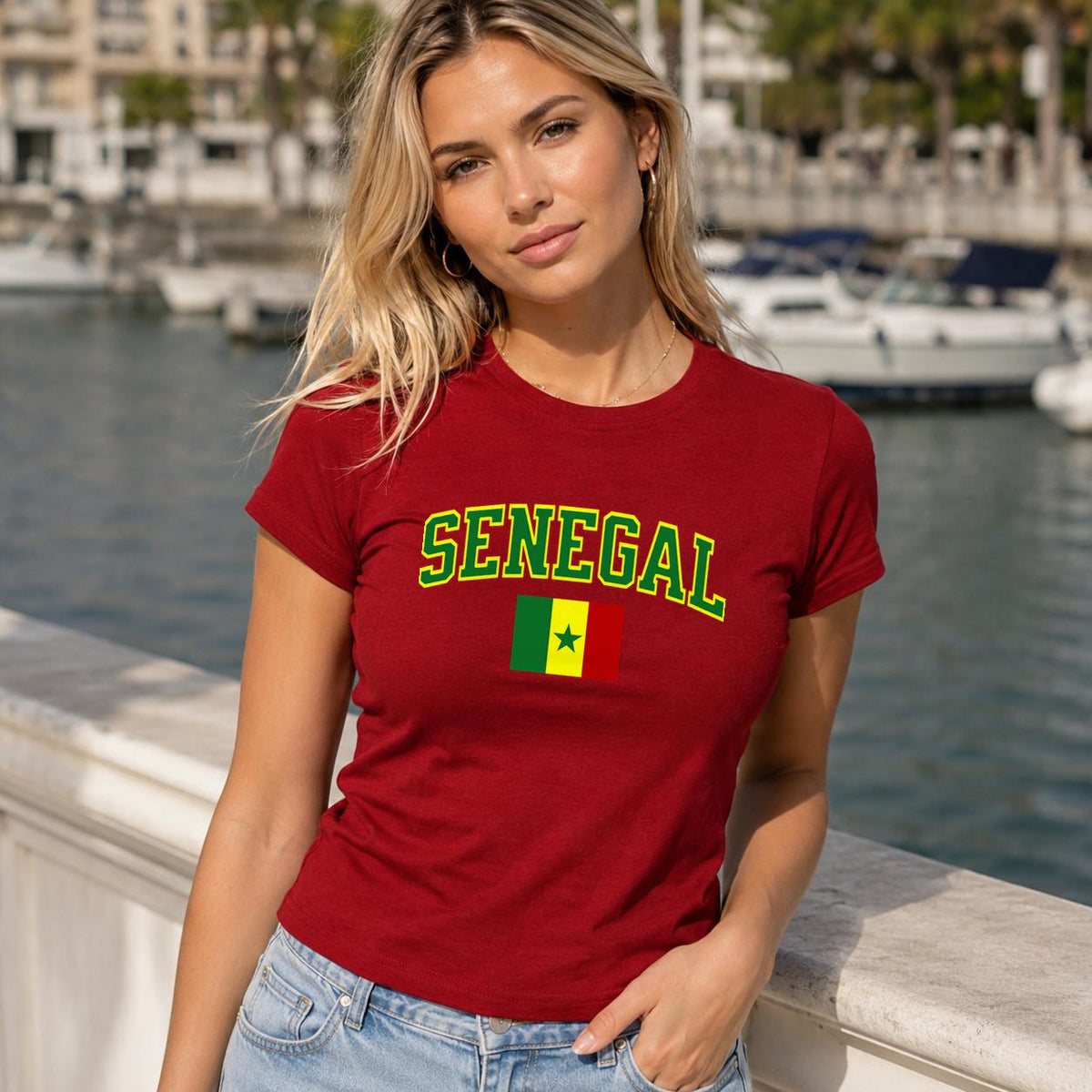 Fitted green baby tee with arched Senegal lettering and Senegal flag graphic