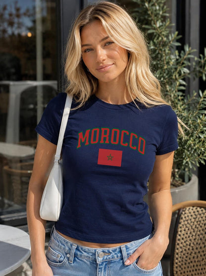 Green baby tee with red arched MOROCCO lettering and Moroccan flag graphic