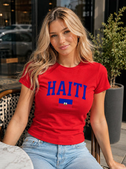 Navy baby tee with bold HAITI varsity lettering and Haitian flag graphic