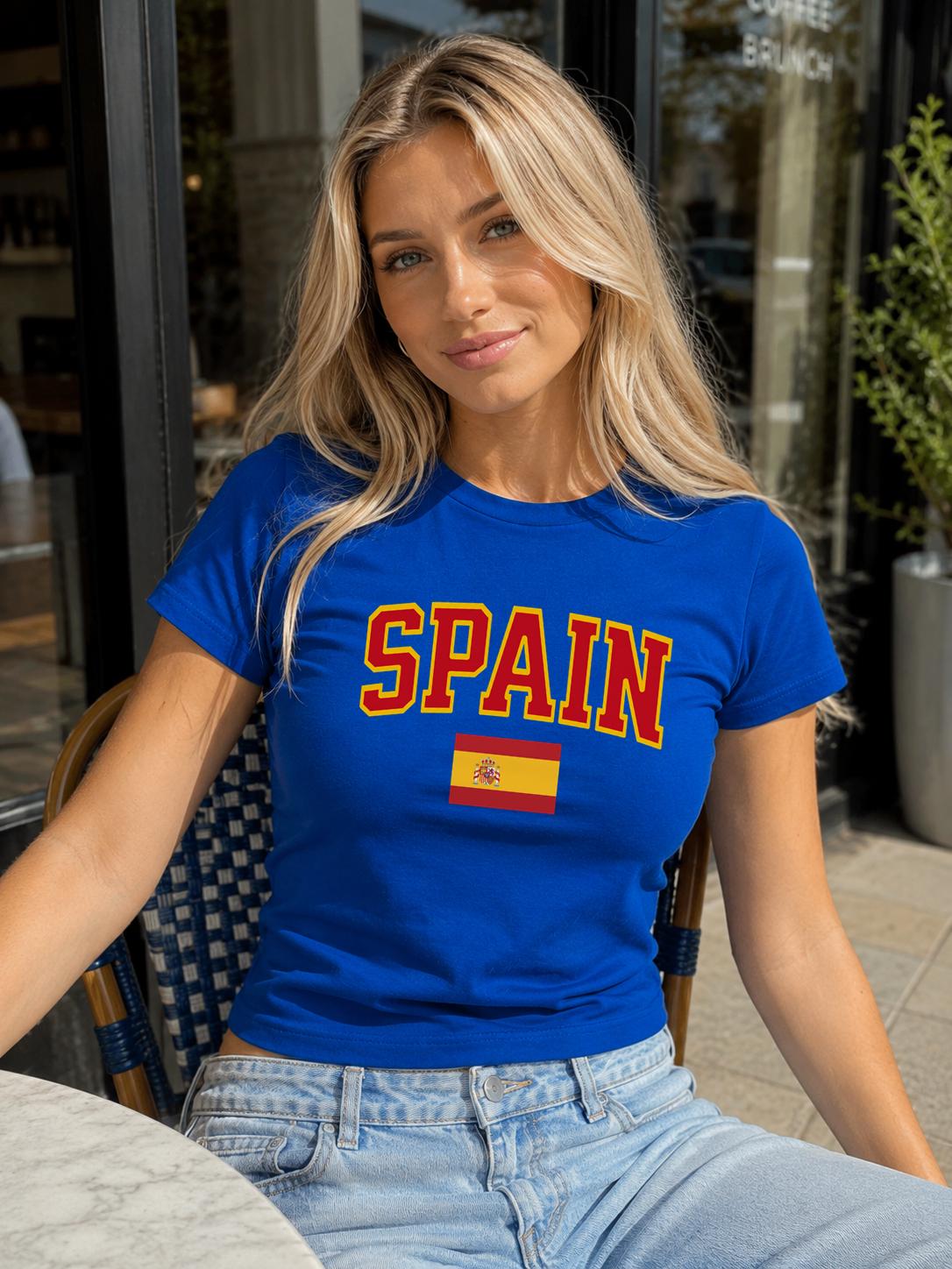 Spain baby tee with bold varsity lettering and Spanish flag graphic