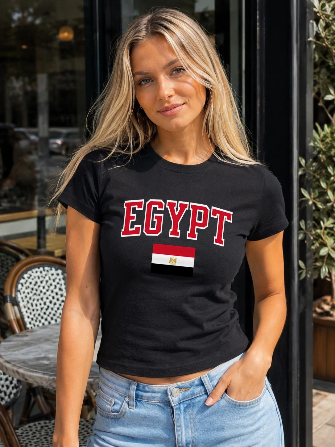 Black baby tee with red EGYPT varsity lettering and Egyptian flag graphic.