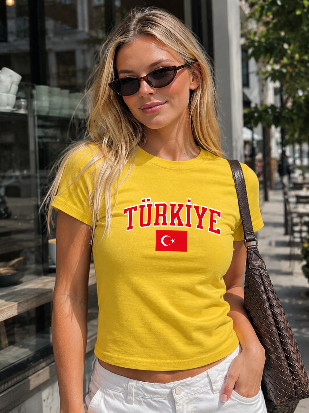 Red baby tee with bold Türkiye lettering and Turkish flag crescent and star graphic