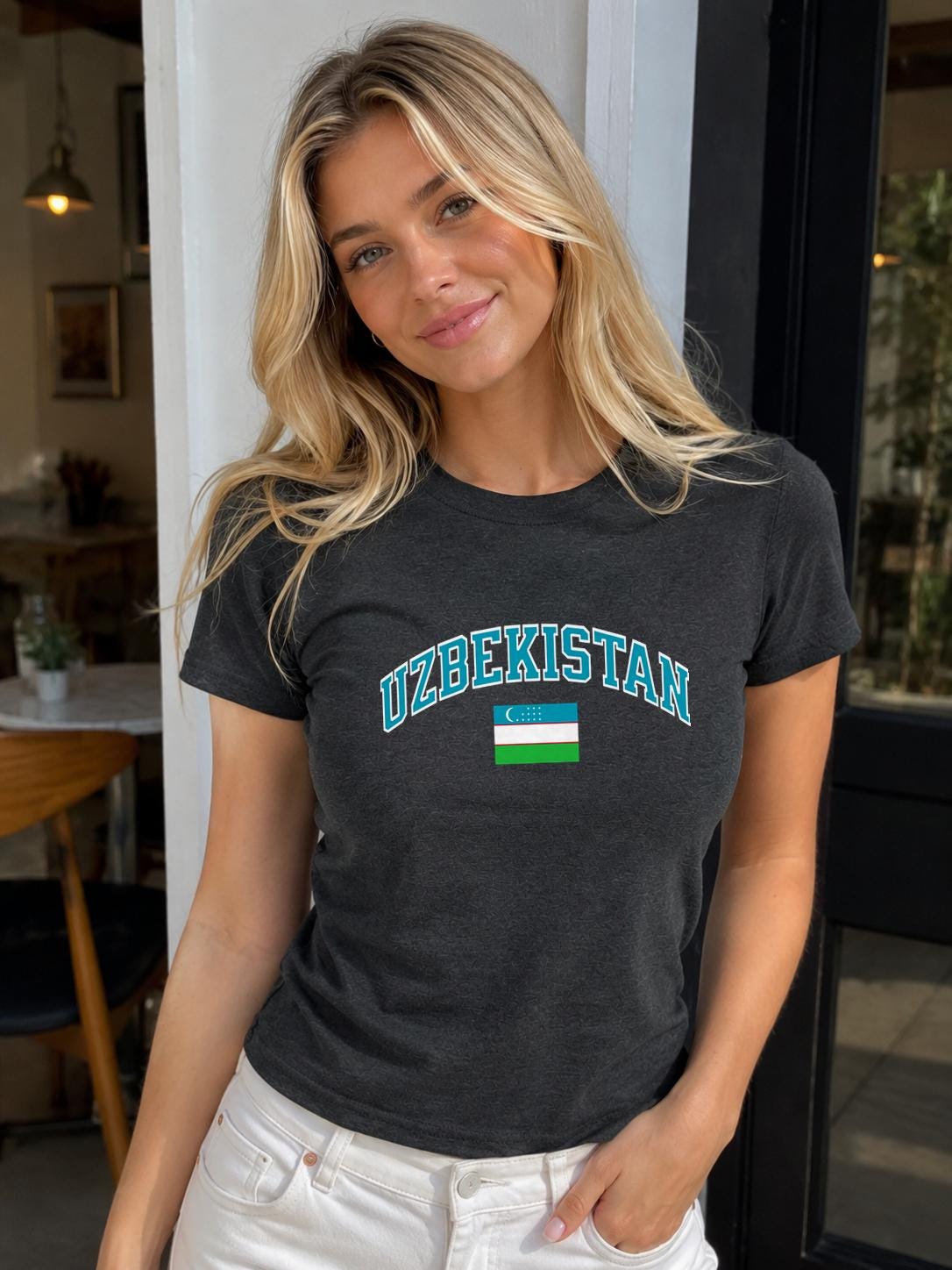 Blue baby tee with arched Uzbekistan lettering and Uzbekistan flag graphic
