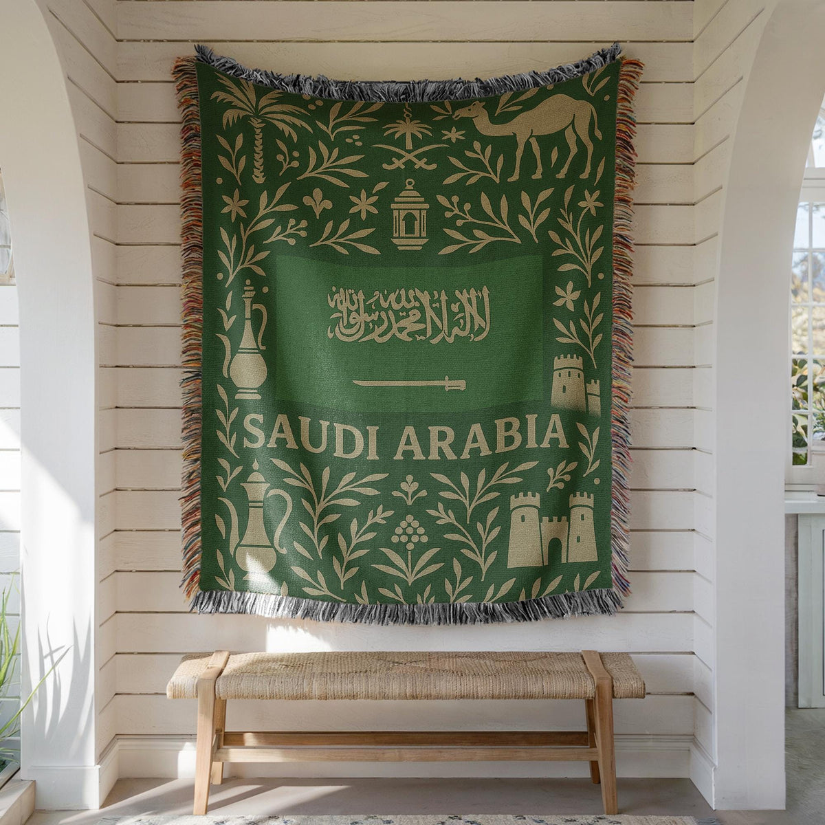 Green Saudi Arabia woven blanket with Arabic script, camel, palm trees, sword, lanterns, and fringe edges