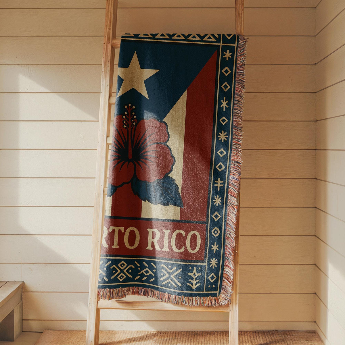 Puerto Rico woven blanket with flag-inspired design, hibiscus flower, decorative border, and fringe edges
