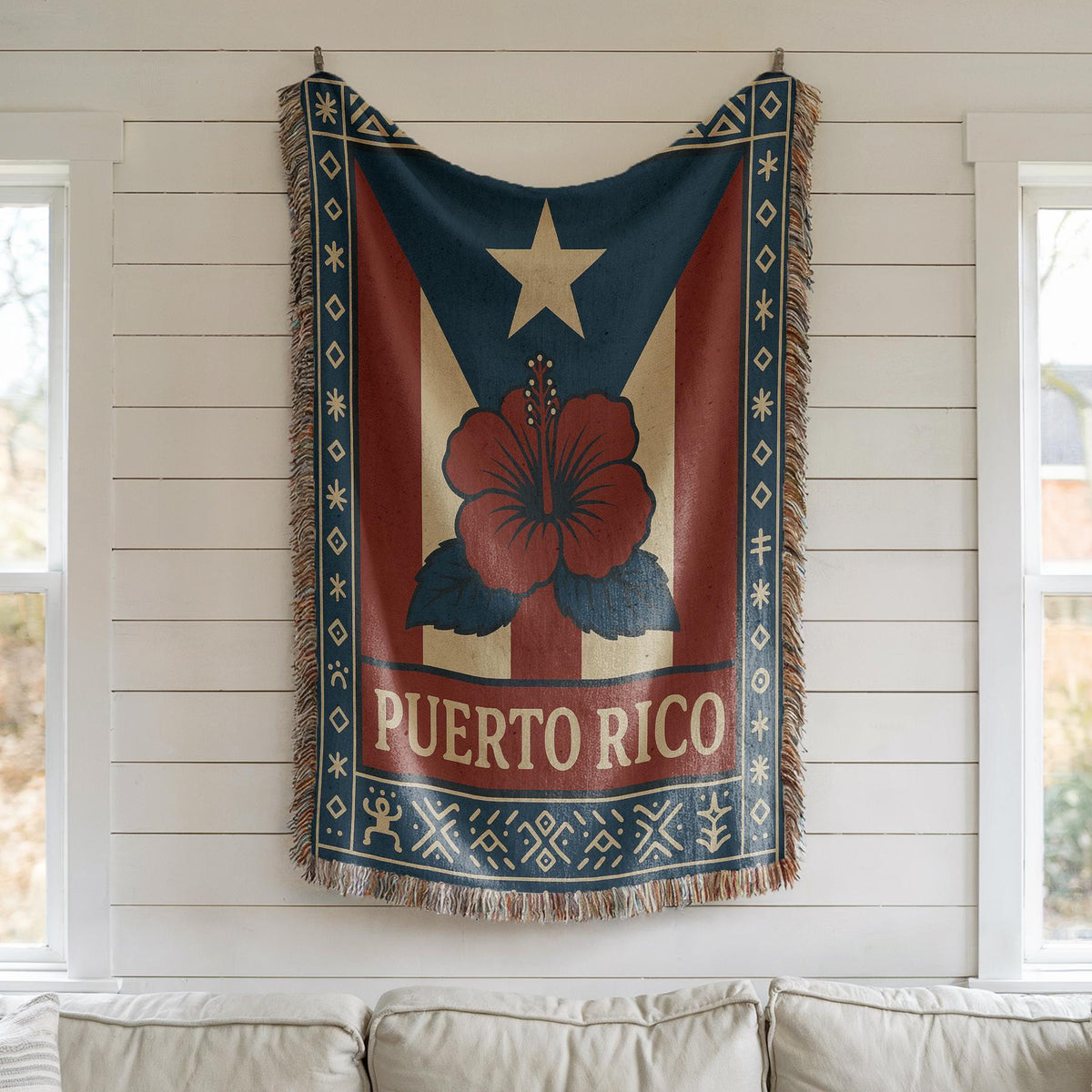 Puerto Rico woven blanket with flag-inspired design, hibiscus flower, decorative border, and fringe edges