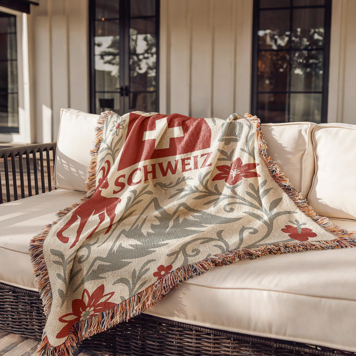 Woven blanket with Schweiz Swiss flag, alpine mountains, flowers, chalet, cowbell and ibex design