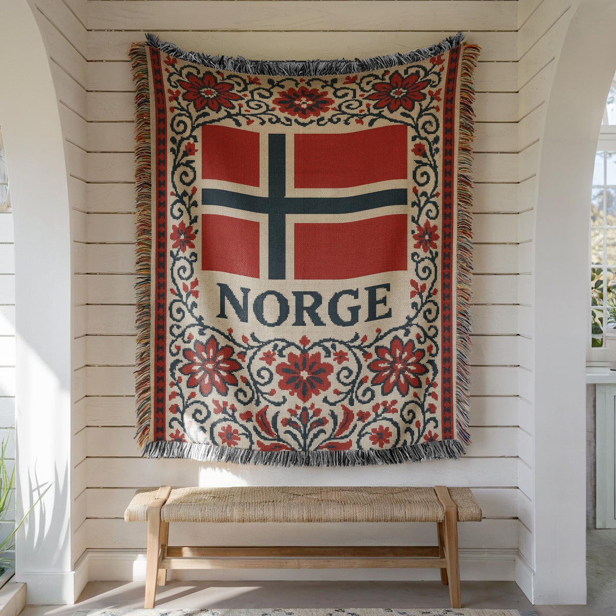 Woven blanket with Norway flag, NORGE text, red floral Nordic border, and fringe edges
