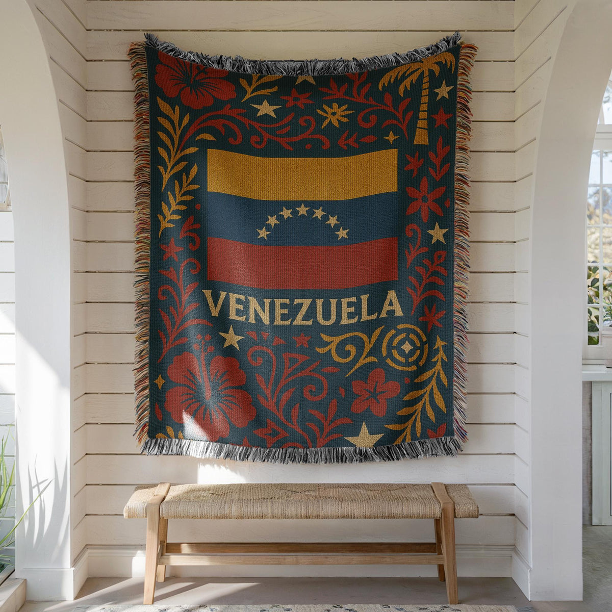 Woven blanket with Venezuela flag, Venezuela text, stars, palm tree and red floral folk art