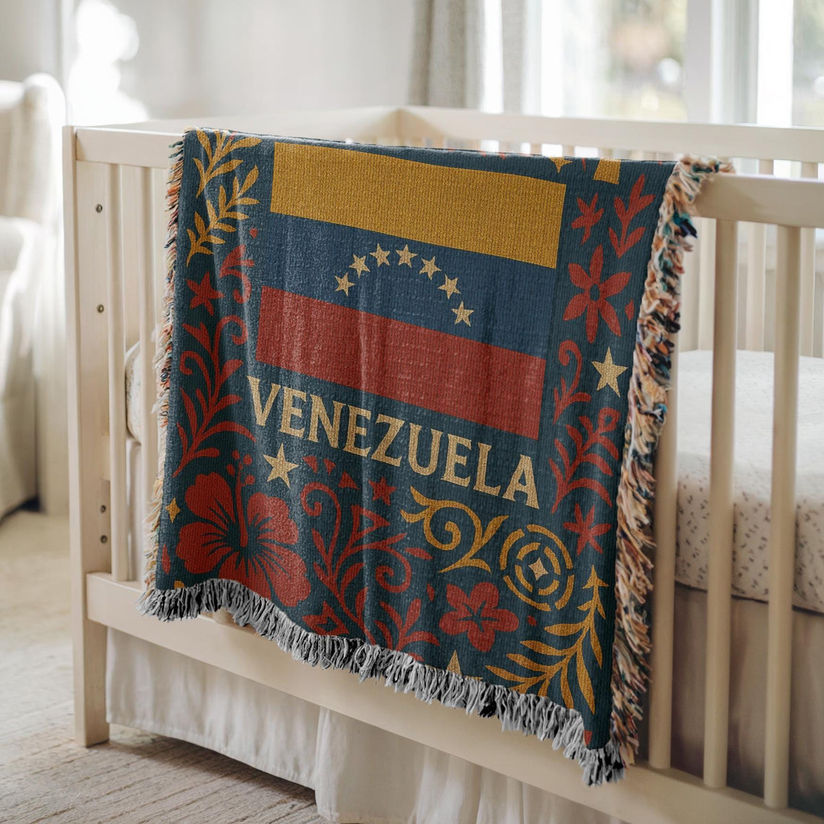 Woven blanket with Venezuela flag, Venezuela text, stars, palm tree and red floral folk art