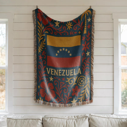 Woven blanket with Venezuela flag, Venezuela text, stars, palm tree and red floral folk art