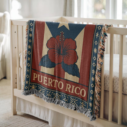 Puerto Rico woven blanket with flag-inspired design, hibiscus flower, decorative border, and fringe edges