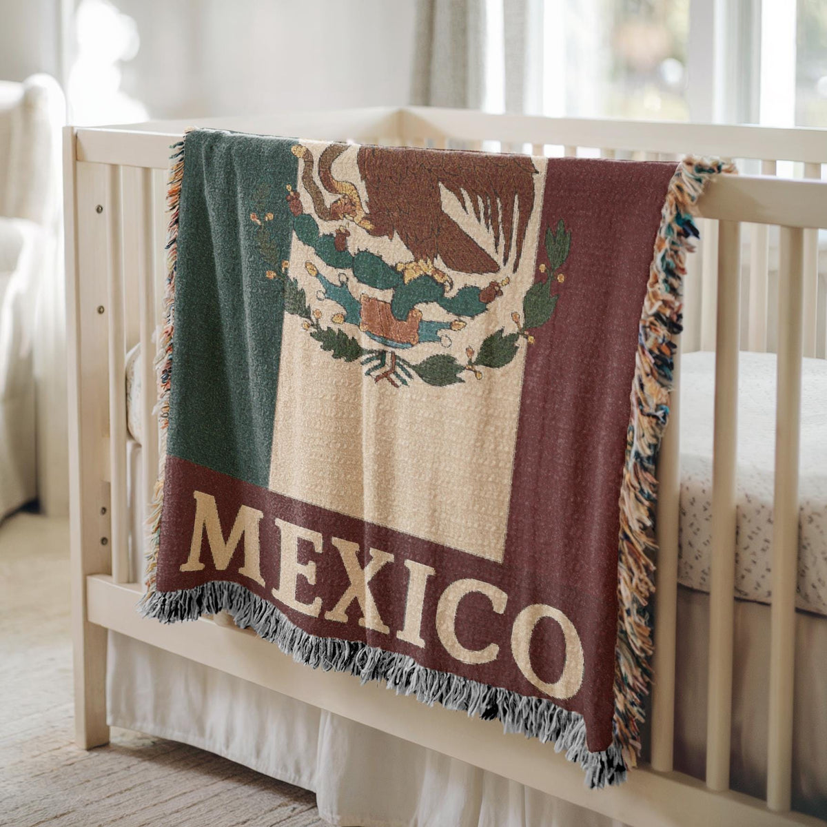Woven blanket featuring the Mexico flag with eagle coat of arms and MEXICO text