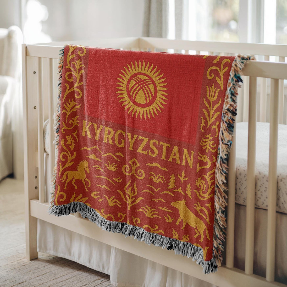 Red and gold Kyrgyzstan woven blanket with horses, mountains, ornamental borders, and fringe edges